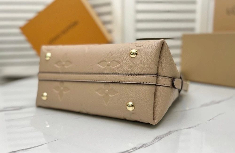 Louis Vuitton CarryAll PM Tote Bag In Creme Leather Design