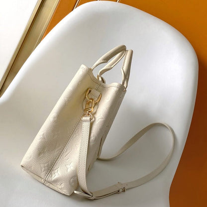 Louis Vuitton Babylone Tote PM in Creme