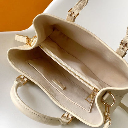 Louis Vuitton Babylone Tote PM in Creme