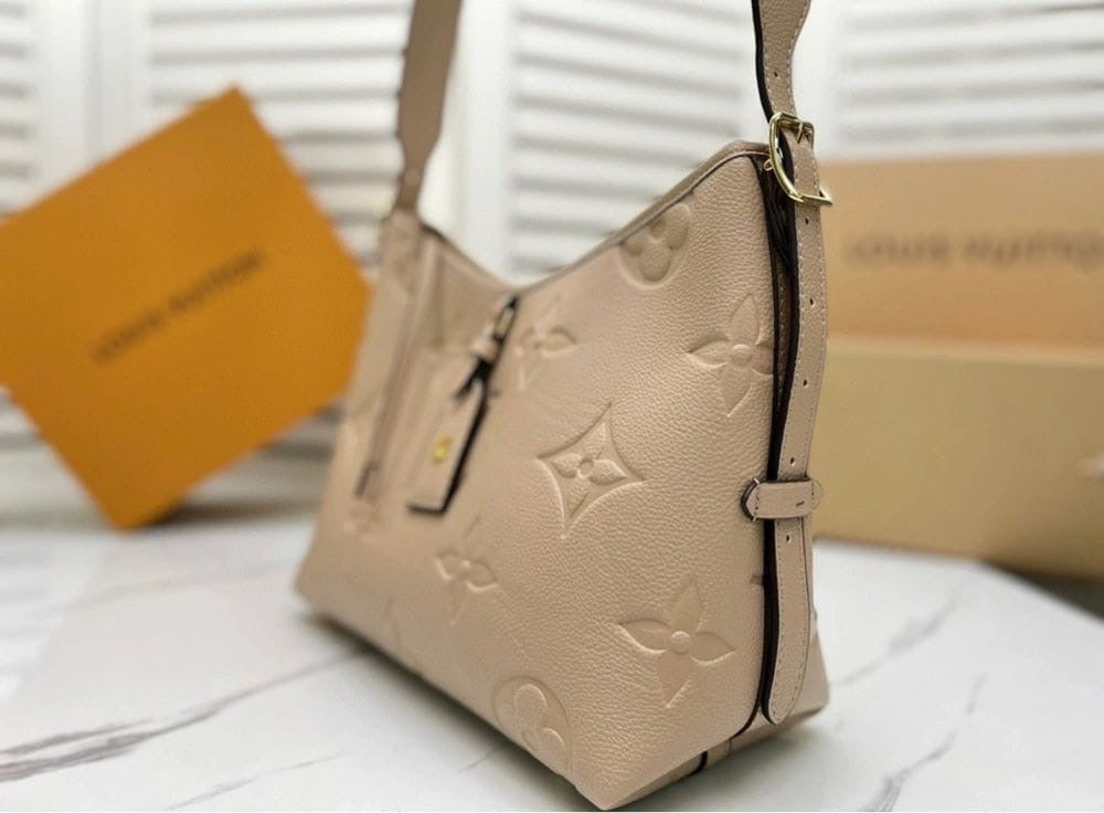 Louis Vuitton CarryAll PM Tote Bag In Creme Leather Design