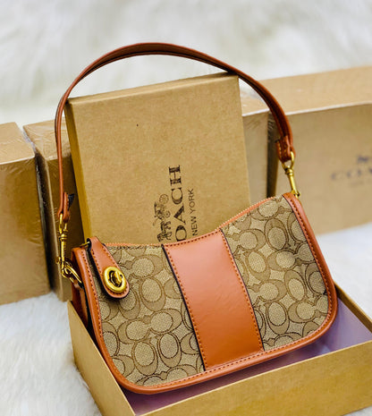 Coach Swinger In Signature Jacquard