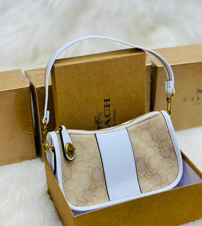 COACH Swinger In Signature Jacquard