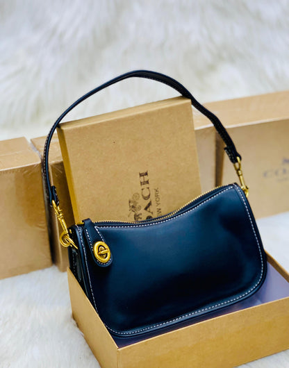 COACH Swinger In Signature Jacquard