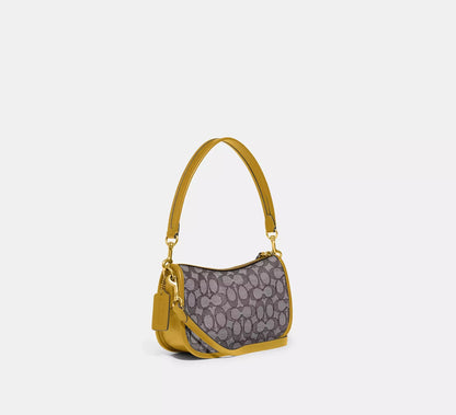 COACH Swinger In Signature Jacquard