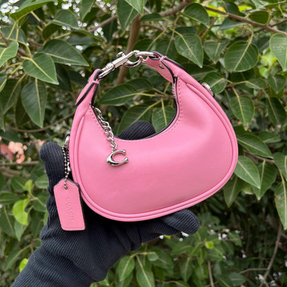 Coach Jonie Bag in Signature Canvas (Pink)